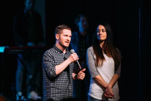 Chris and Jessica Ulery speaking at Victory